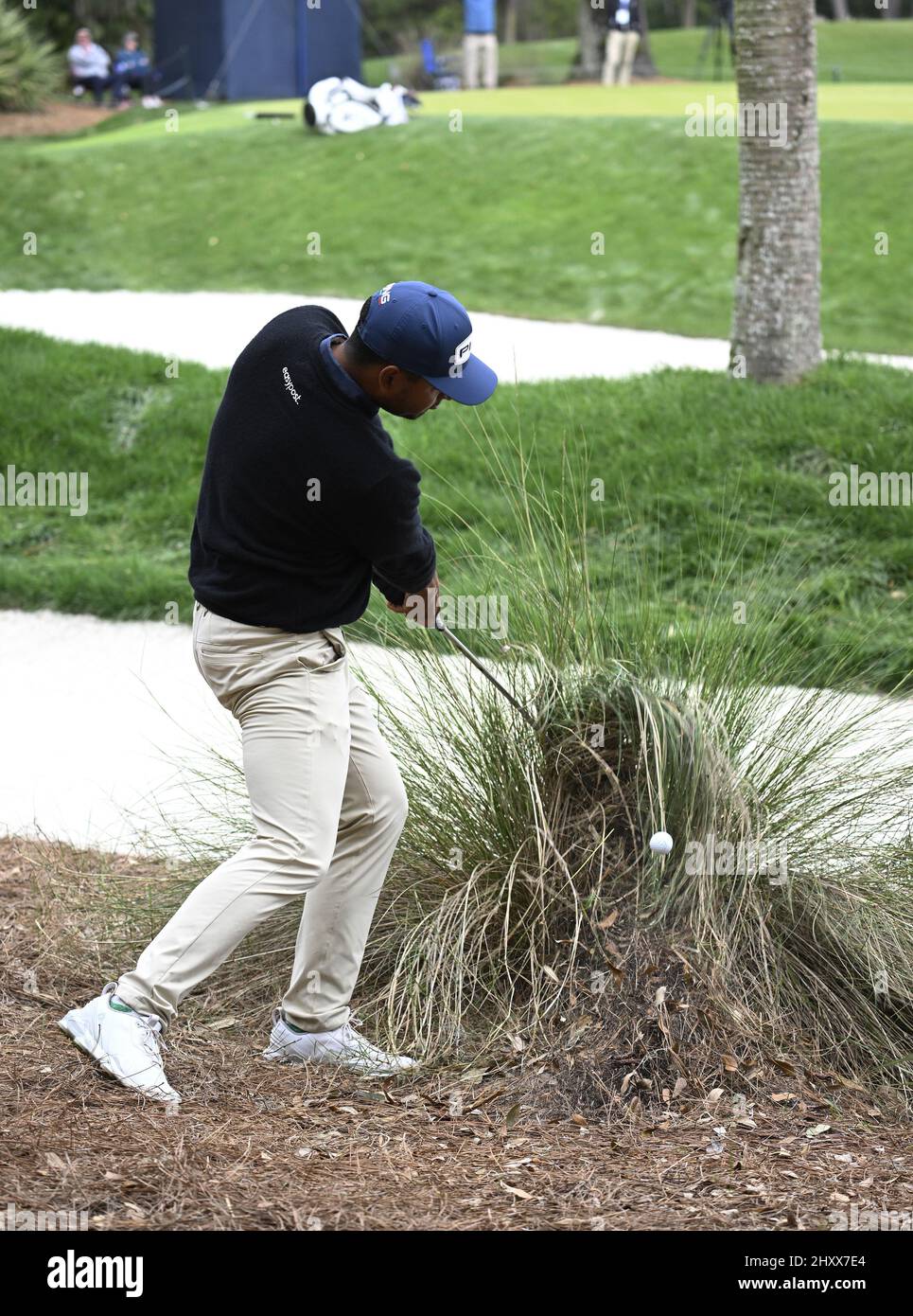 Ponte Vedra Beach, United States. 14th Mar, 2022. Colombia's Sebastian Munoz hits out of the rough on the 1st hole in the final round of the 2022 Players PGA Championship on the Stadium Course at TPC Sawgrass in Ponte Vedra Beach, Florida on Monday, March 14, 2022. The golf tournament has been extended one day due to weather delays. Photo by Joe Marino/UPI Credit: UPI/Alamy Live News Stock Photo
