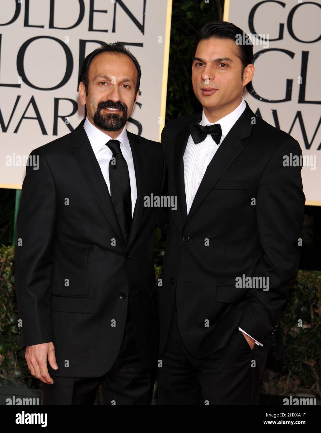 Asghar Farhadi and Payman Maadi at the 69th Annual Golden Globe Awards Ceremony, held at the Beverly Hilton Hotel in Los Angeles, CA on January 15, 2011. Stock Photo