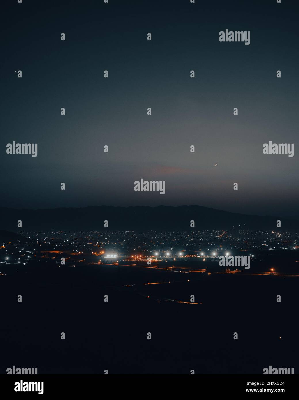 Aerial view of the illuminated cityscape at night Stock Photo - Alamy