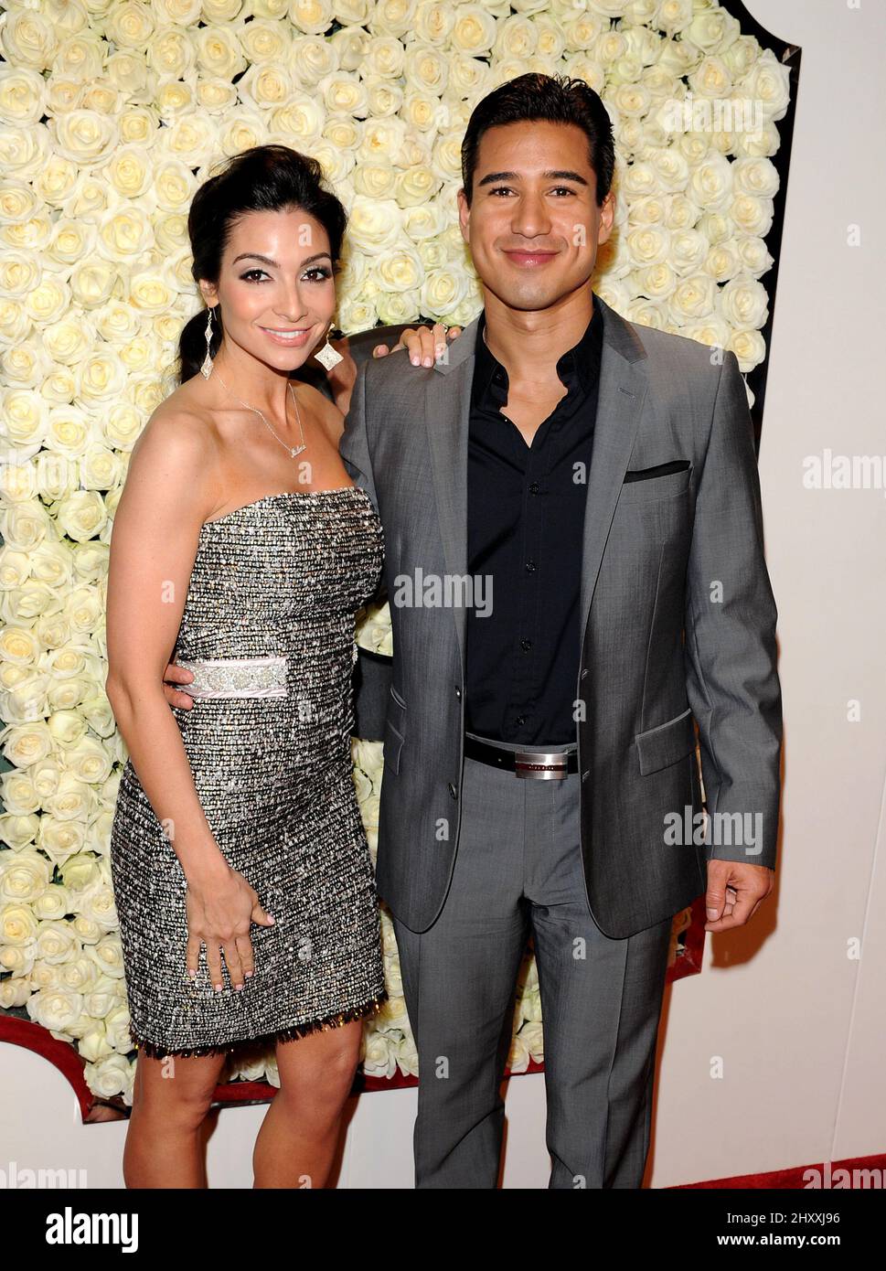 Courtney Laine Mazza and Mario Lopez during the QVC Red Carpet Style