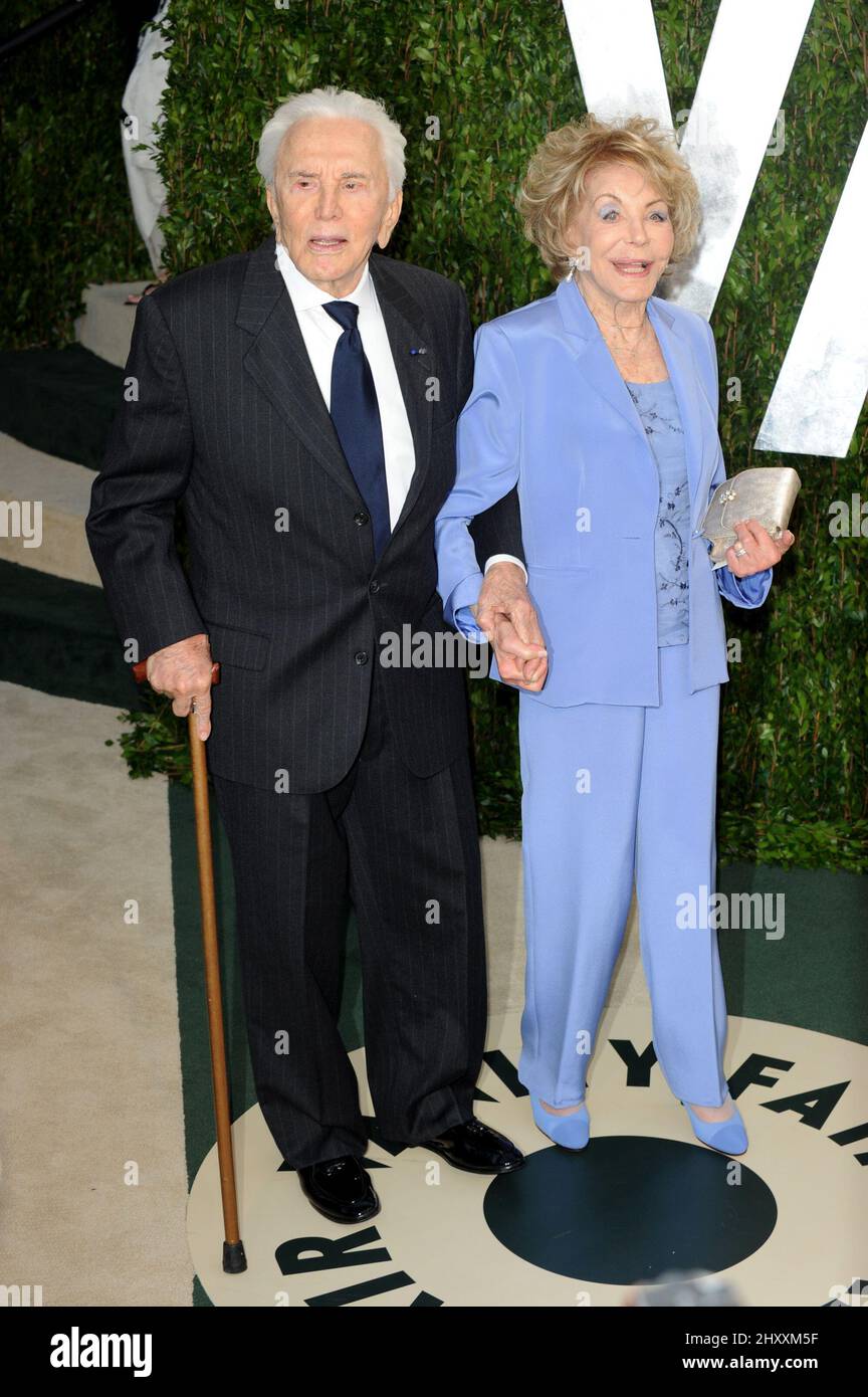 Kirk Douglas and Anne Buydens at the Vanity Fair Oscar party in West Hollywood California Stock Photo