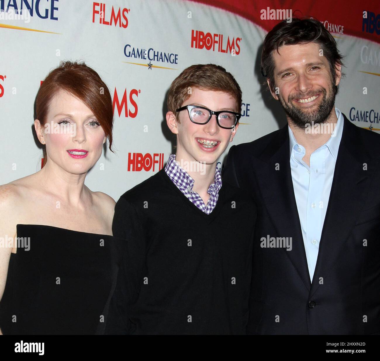 Julianne Moore, son Caleb Freundlich and Bart Freundlich during the 'Game Change' premiere held at the Ziegfeld Theatre, New York Stock Photo