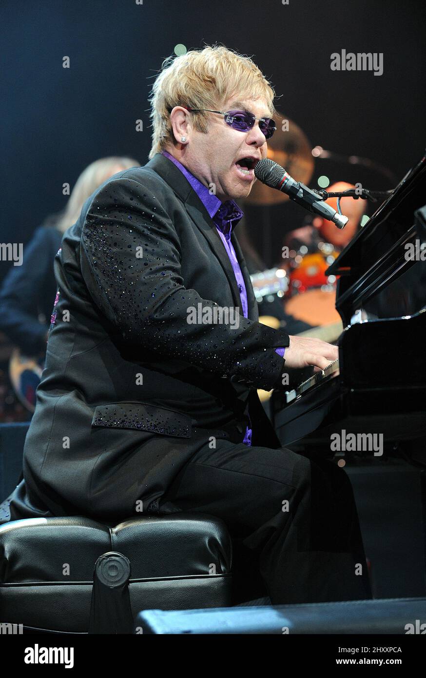 Elton John performs live in concert at the PNC Arena in Raleigh in North Carolina, USA. Stock Photo