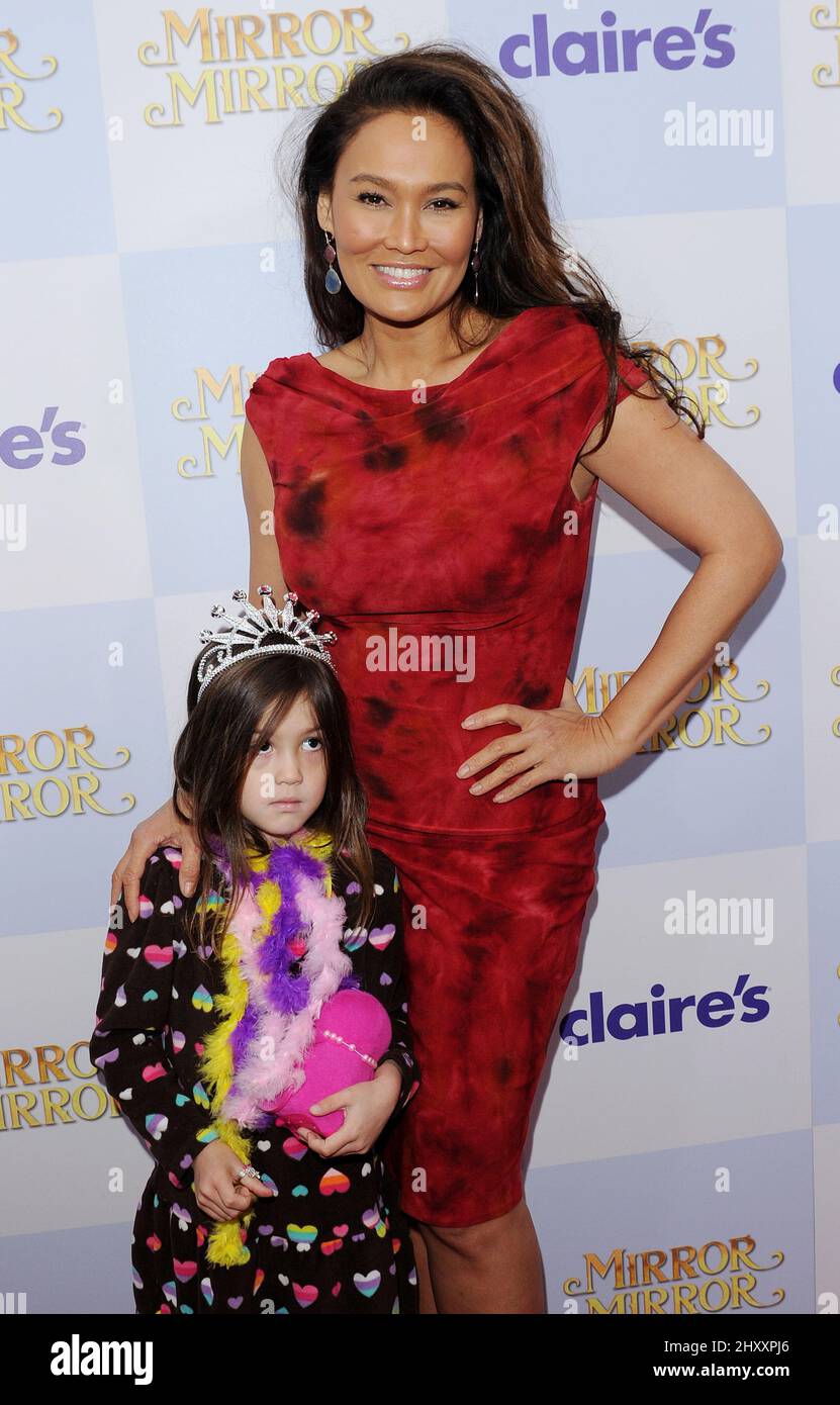 Tia Carrere and daughter attending the 'Mirror Mirror' Los Angeles premiere held at Grauman's Chinese Theatre in Los Angeles, USA. Stock Photo
