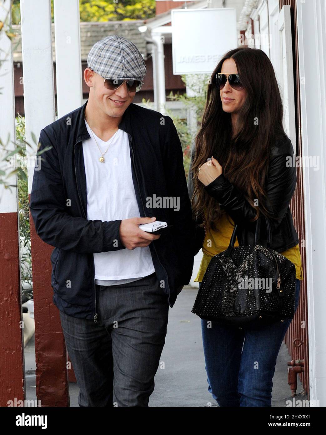 Alanis Morissette and husband Mario "MC Souleye" Treadway are seen