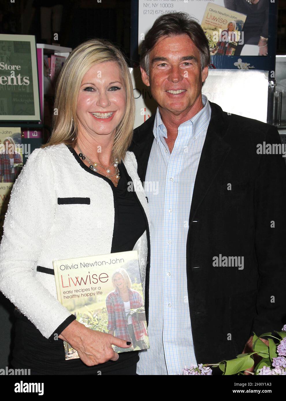 Olivia Newton-John and John Easterling during the 'Livwise' book signing held at Barnes & Noble in New York Stock Photo