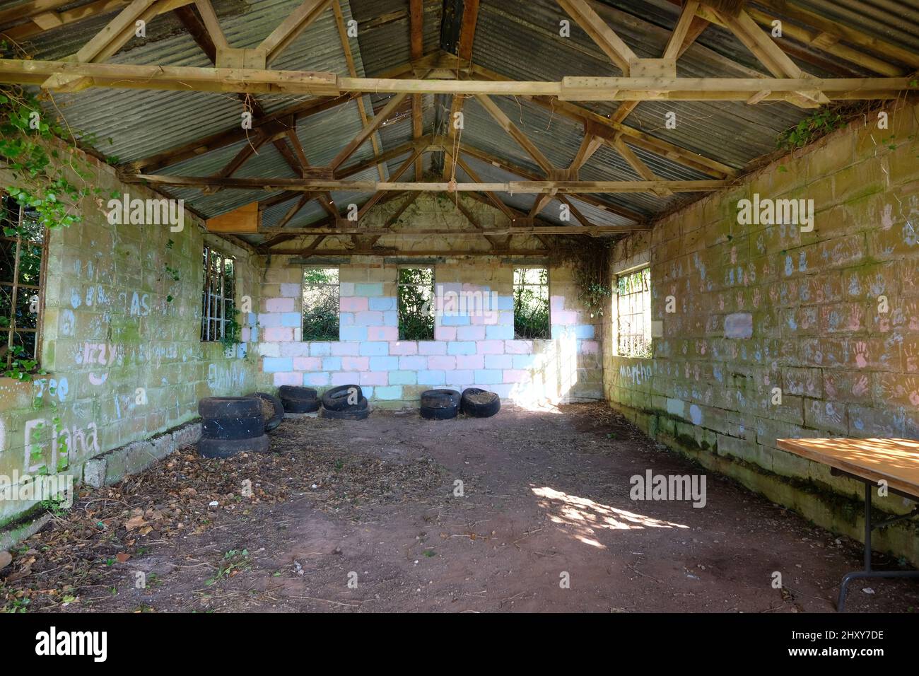 March 2022 - Inside an old barn that has been painted by young people Stock Photo