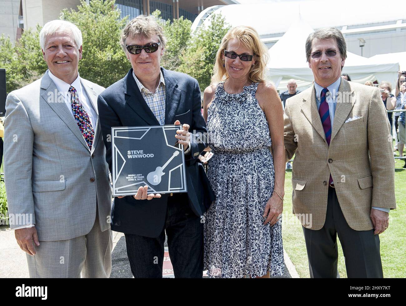 Steve Winwood, Eugenia Winwood, Dr. Bob Fisher, Marc Stengel as Steve Winwood is honoured at the 2012 Music City Walk of Fame Induction Ceremony in Nashville, USA. Stock Photo