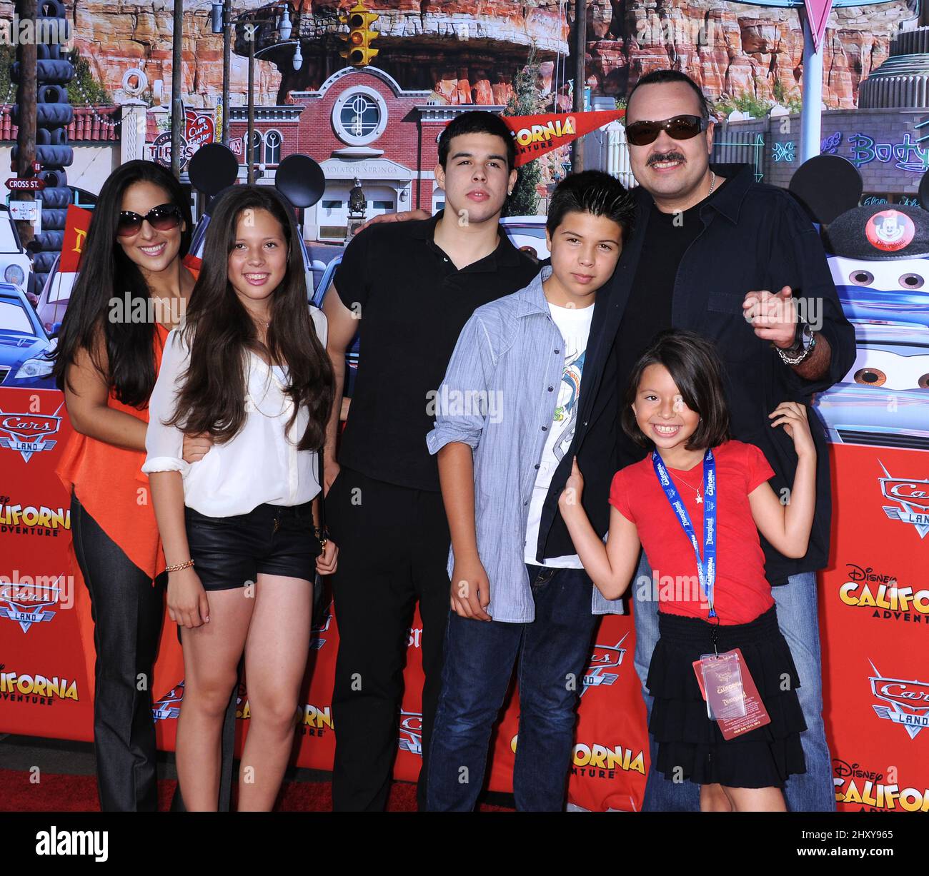Pepe Aguilar, wife Anelisse and kids attends the 'Cars Land' opening at