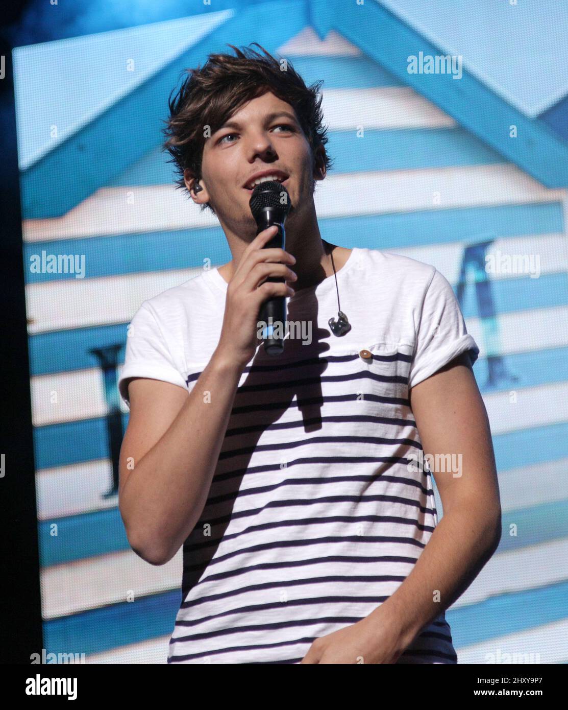 Mar. 06, 2012 - Durham, North Carolina; USA - Singer LOUIS TOMLINSON of the  band One Direction performs live as their 2012 tour makes a stop at the  Durham Performing Arts Center.