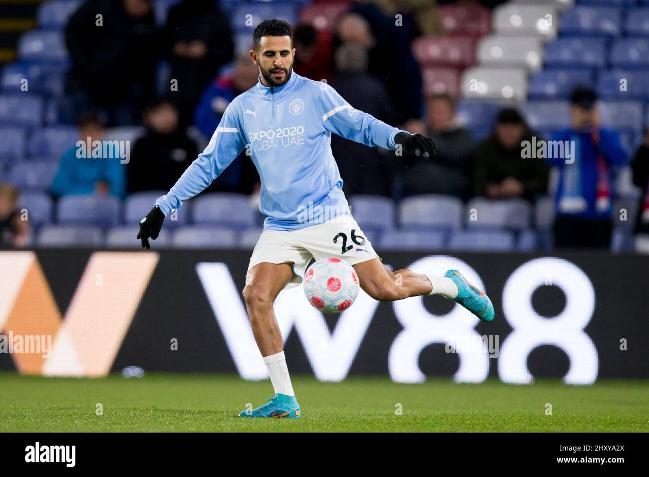 LONDON, UK. MAR 14TH Riyad Mahrez of Manchester City warms up during the Premier League match between Crystal Palace and Manchester City at Selhurst Park, London on Monday 14th March 2022. (Credit: Federico Maranesi | MI News) Credit: MI News & Sport /Alamy Live News Stock Photo