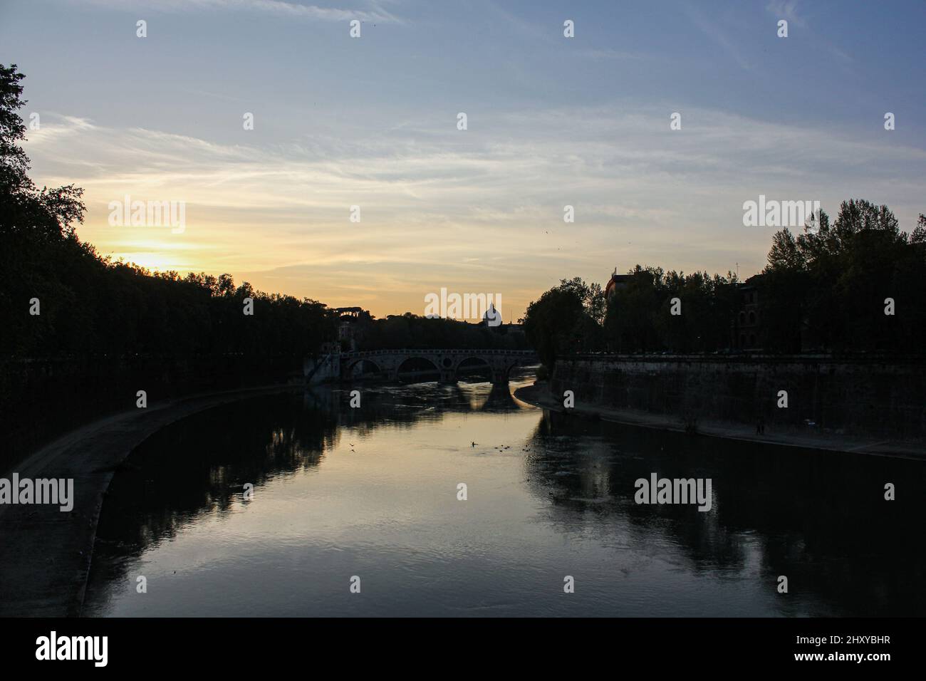 Landscape of a sky reflecting in water during sunset Stock Photo - Alamy