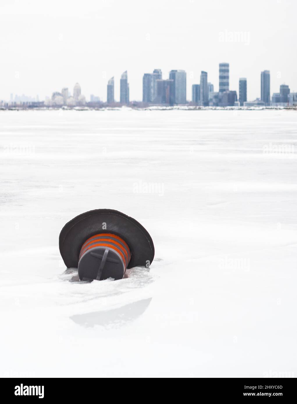 Vertical shot of an object on the snow in Downtown, Toronto, Ontario ...