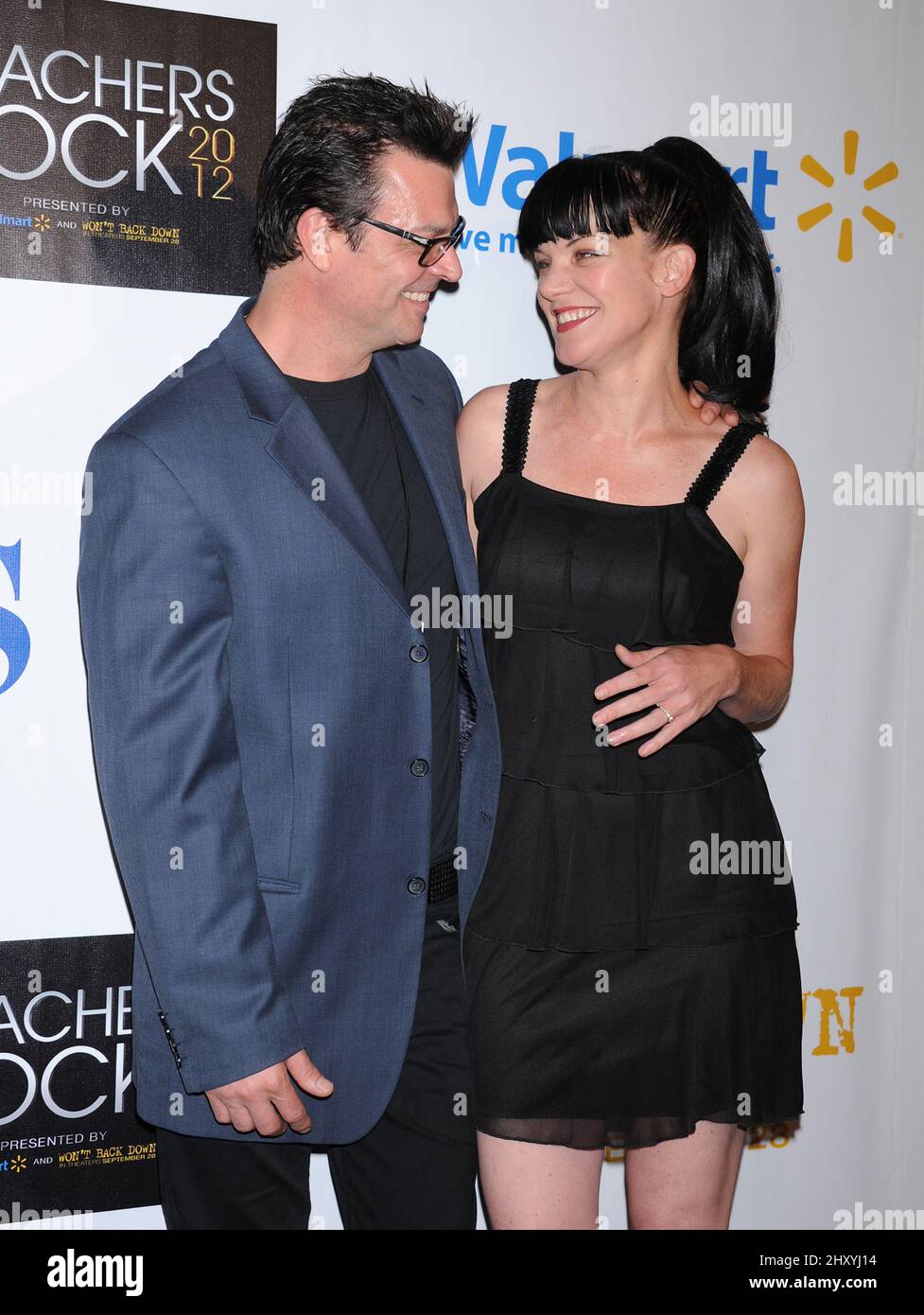 Pauley Perrette and finace Thomas Arklie attends CBS' Teacher's Rock Special Live Concert Press Room at Nokia Theatre L.A. Live, Los Angeles. Stock Photo