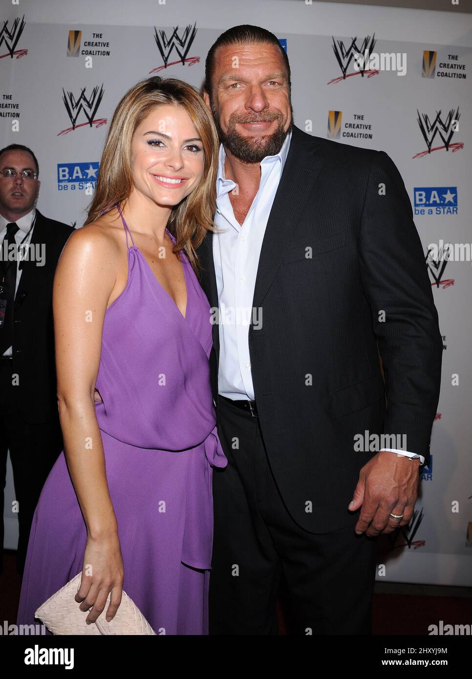 Triple H and Maria Menounos attends the WWE SummerSlam VIP Kick-Off Party held at the Beverly Hills Hotel, Los Angeles, California. Stock Photo