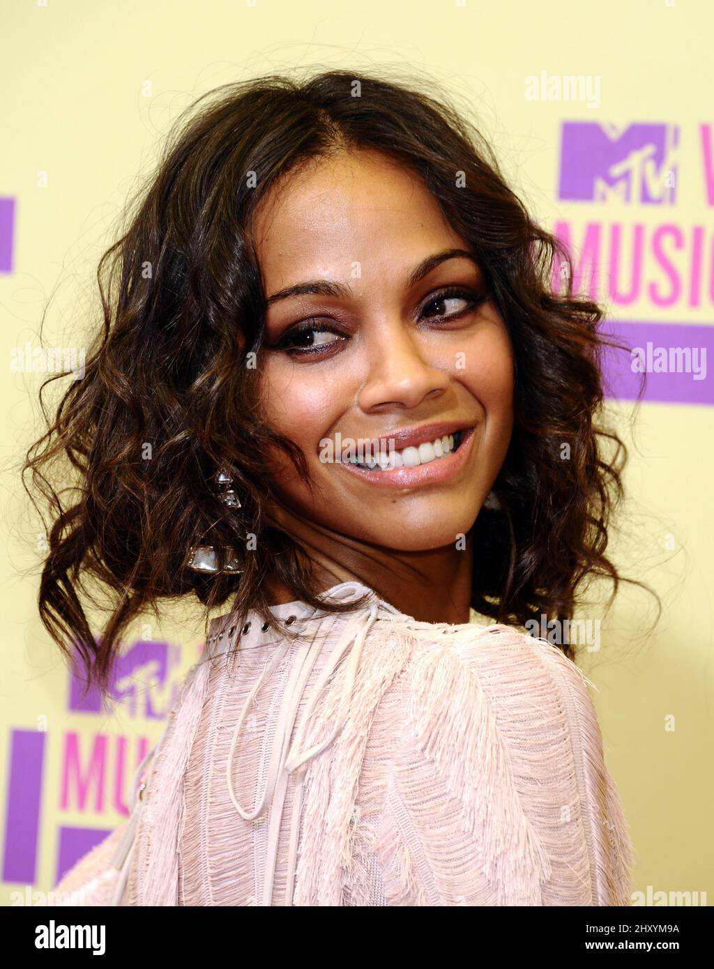 Zoe Saldana arriving at the 2012 MTV Video Music Awards at Staples