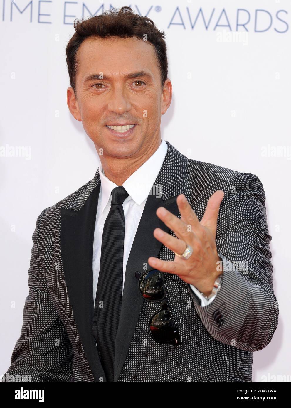 Bruno Tonioli attends the 64th Primetime Emmy Awards held at the Nokia Theatre, Los Angeles. Stock Photo