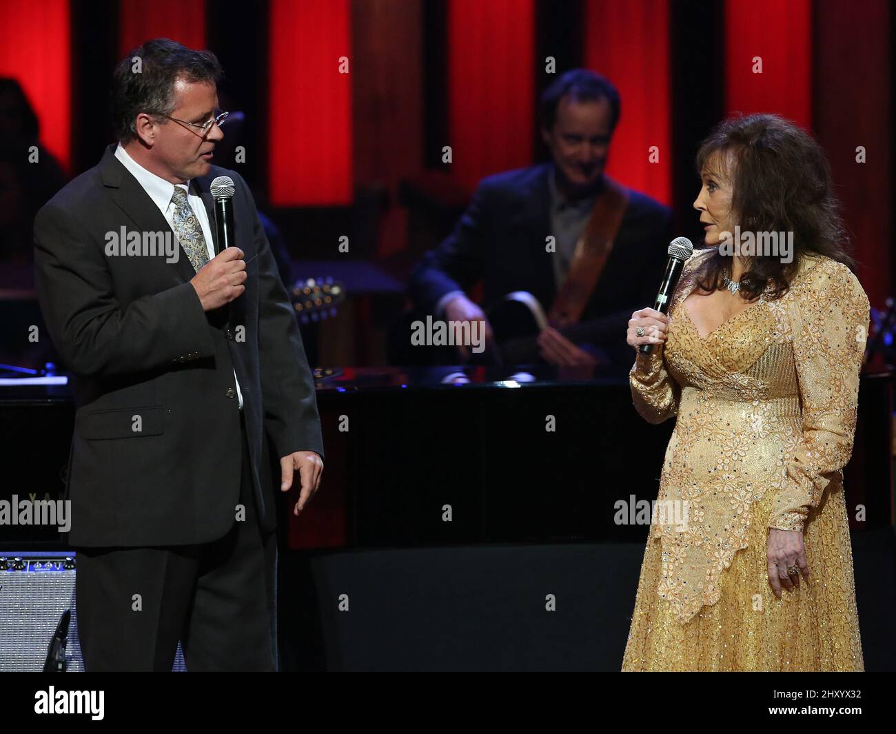 Loretta Lynn and Grand Ole Opry General Manager Pete Fisher attending Loretta Lynn's 50th Grand Ole Opry Anniversary at the Grand Ole Opry House, Tennessee. Stock Photo