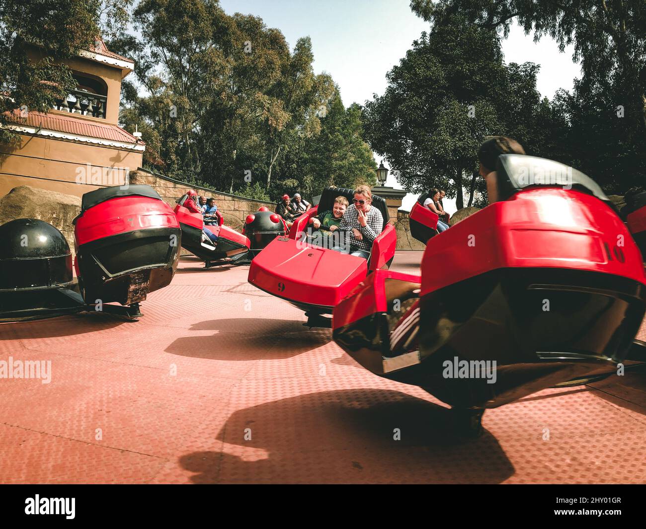 People on Amusement Park Ride Stock Photo - Alamy