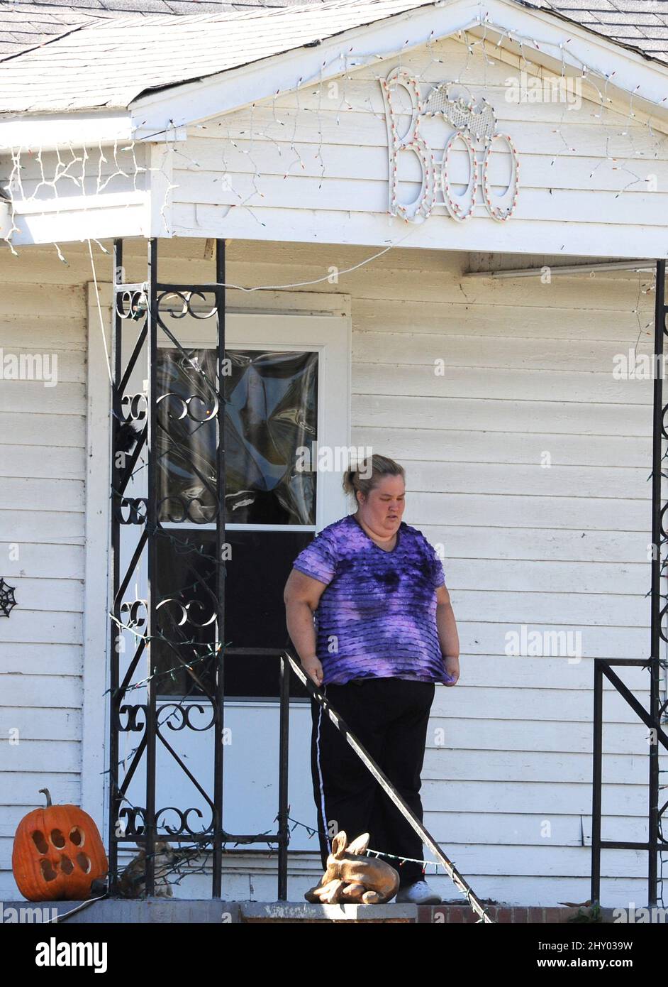 June Thompson, mother of Honey Boo Boo, standing on her porch in McIntyre, **Non