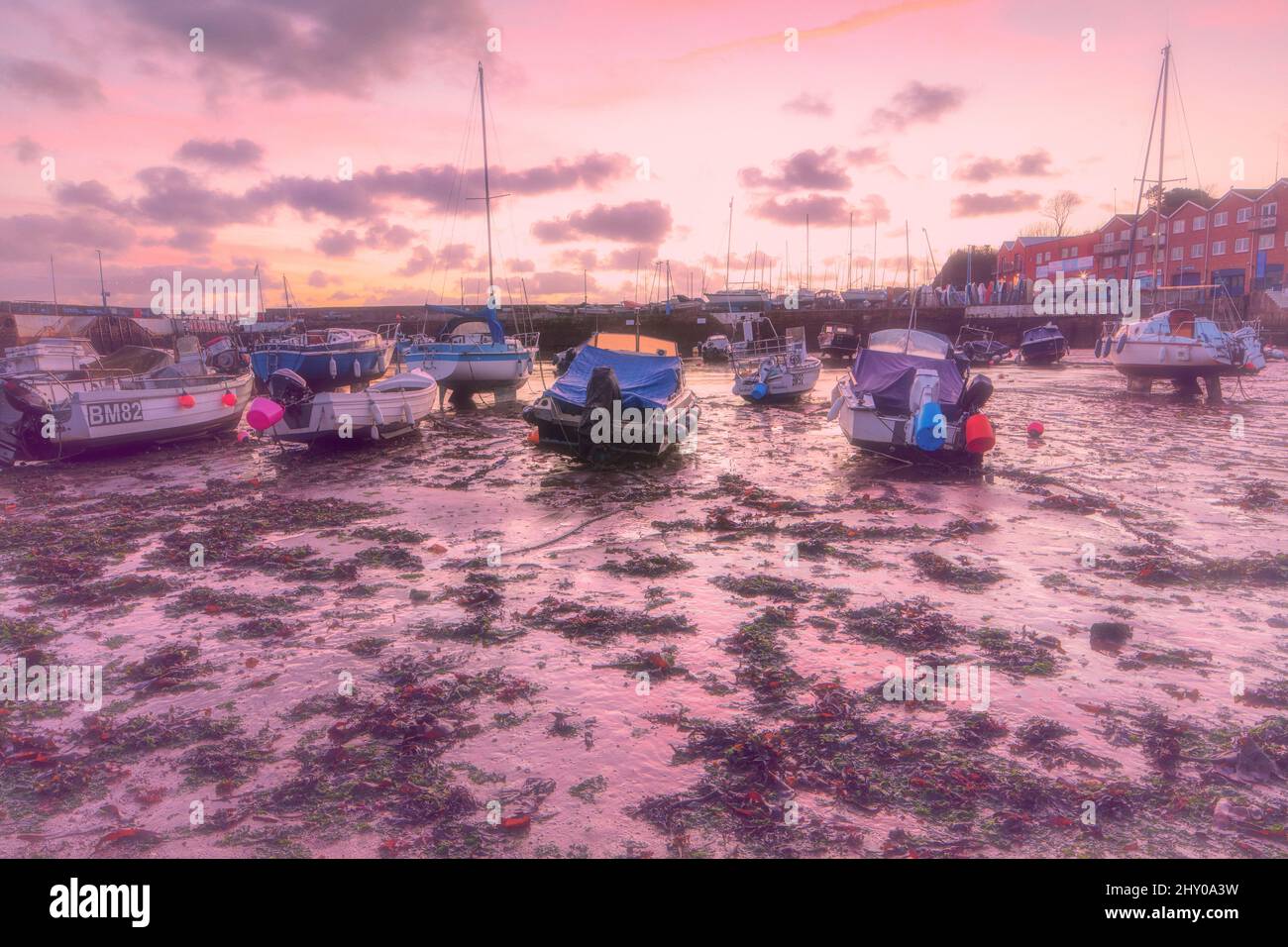 Wholesome dawn scene of the tourist town of Paignton at low tide with