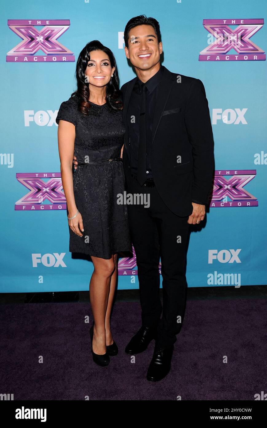 Mario Lopez and wife Courtney Mazza attend the \, image size:869x1390