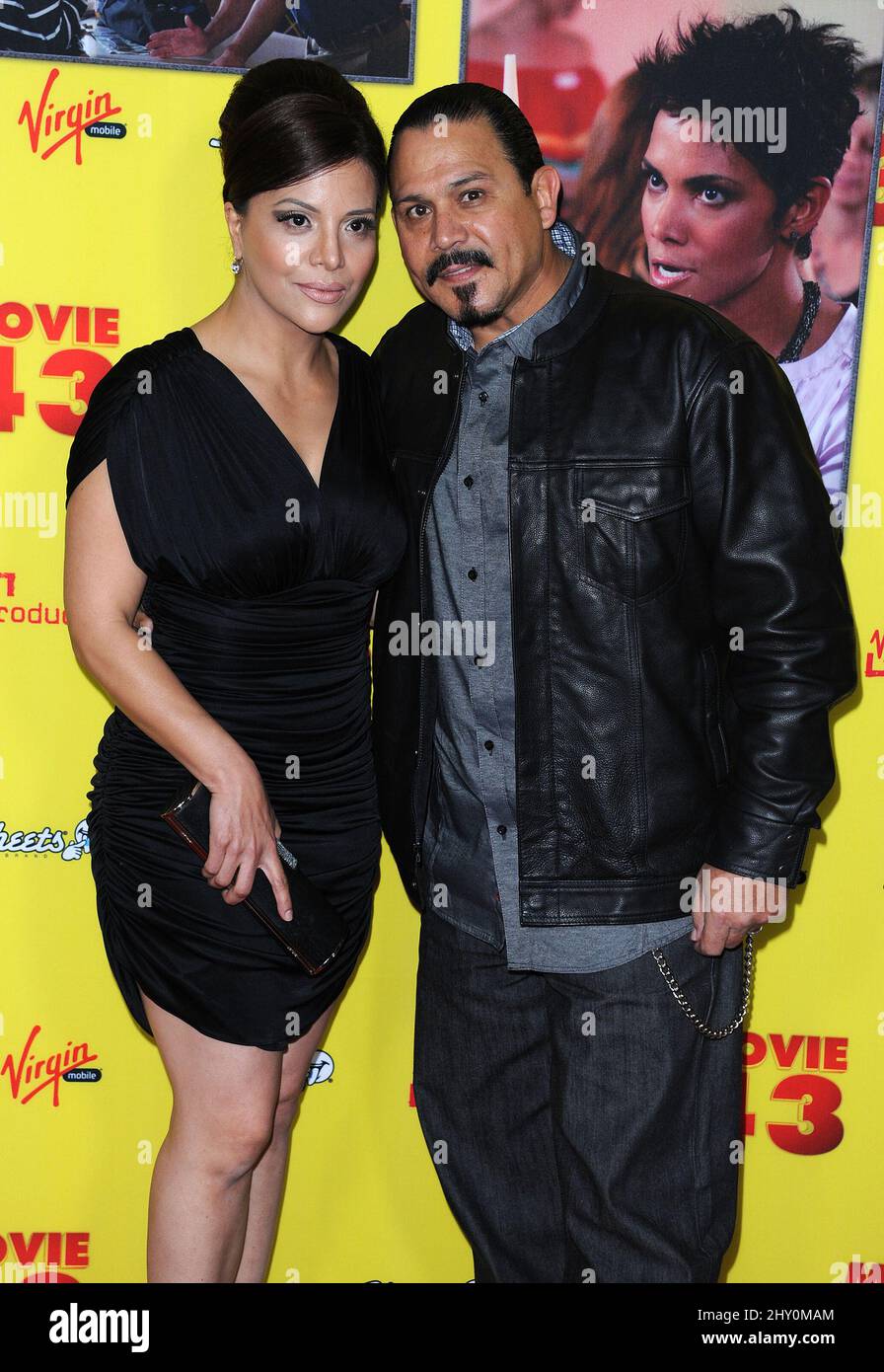 Emilio Rivera and Yadi Valerio attends the 'Movie 43' premiere held at Grauman's Chinese Theatre, Los Angeles. Stock Photo