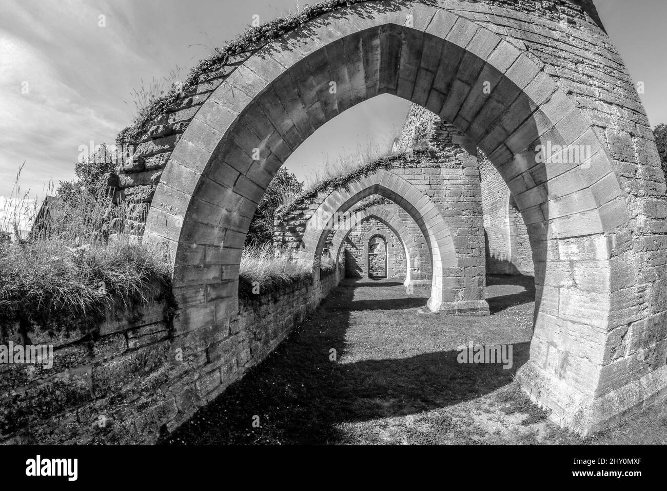 The ruins of the old monastery in Alvastra in Sweden during the nice summer day. A tourist attraction. Stock Photo