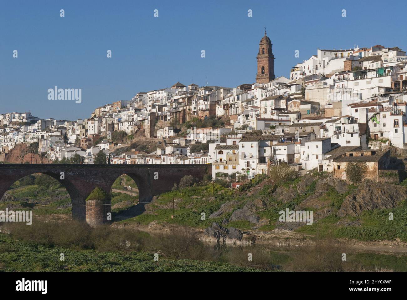 El Rio Spain Scenic view of a bridge above a river against the white town of ...