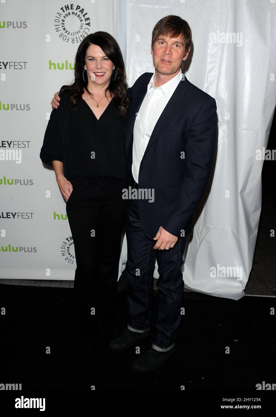Lauren Graham and Peter Krause attending a photocall 'Parenthood' at PaleyFest 2013, held at the Saben Theater in Los Angeles, California. Stock Photo