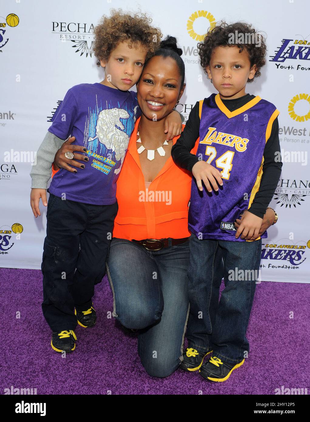 Garcelle Beauvais and her kids arriving at the 2013 Lakers Casino Night at Club Nokia LA Live on Sunday, March 10, 2013 in Los Angeles. Stock Photo