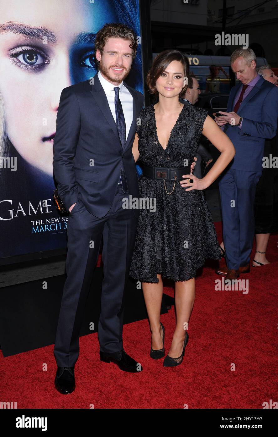 Richard Madden and Jenna-Louise Coleman attending the season 3 premiere of the show 'Game Of Thrones' in Hollywood, California. Stock Photo