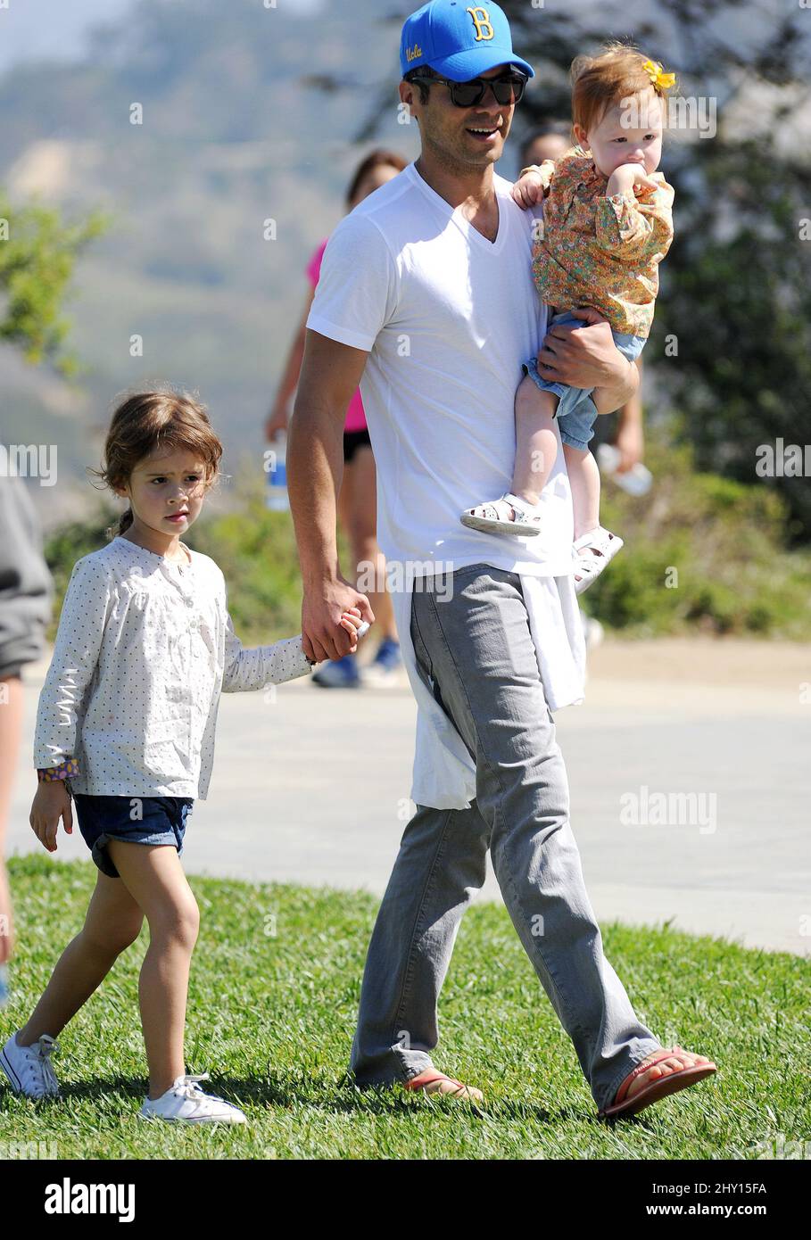 Cash Warren and his daughters attending a birthday party at Griffith