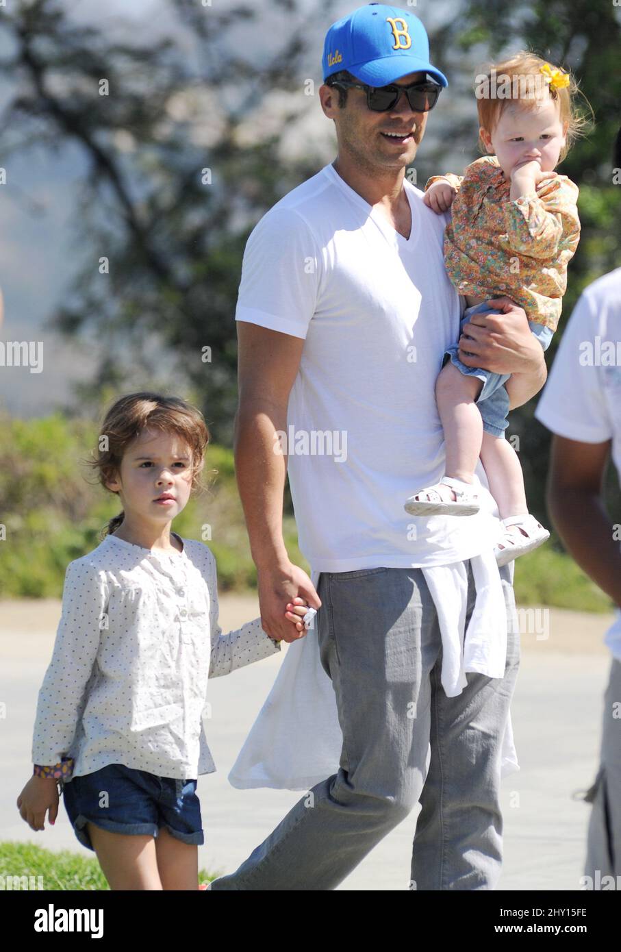 Cash Warren and his daughters attending a birthday party at Griffith