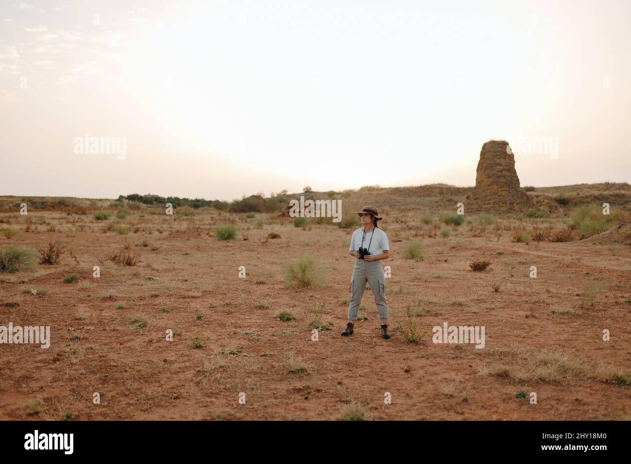 Woman binoculars in desert hi-res stock photography and images - Alamy
