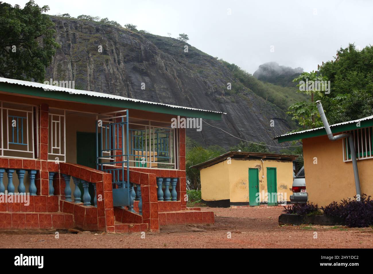 Closeup shot of red and yellow houses in Kabala, Sierra Leone Stock Photo