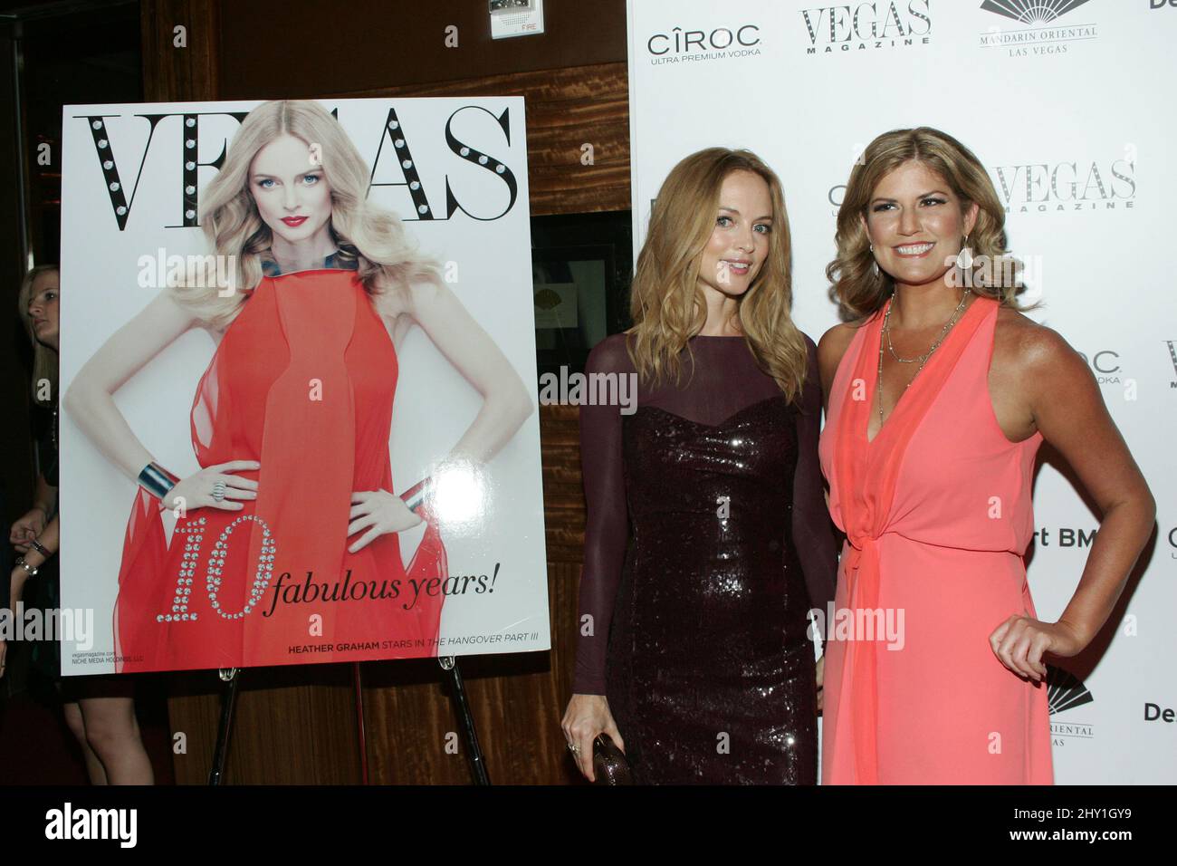 Heather Graham, Abby Tegnelia (Editor-in-Chief of Vegas Magazine arrives as 'Vegas Magazine' celebrates its 10th annivesary with May Issue Cover Model Heather Graham, at the Mandarin Oriental Hotel, Las Vegas, NV Stock Photo