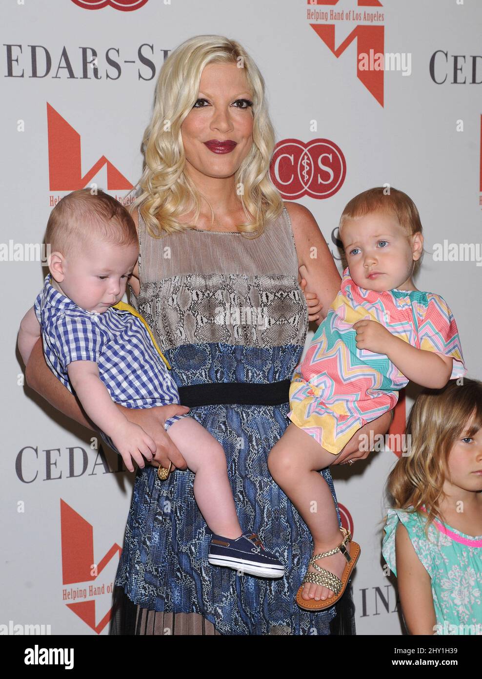 Tori Spelling, Finn McDermott and Hattie McDermott attending The