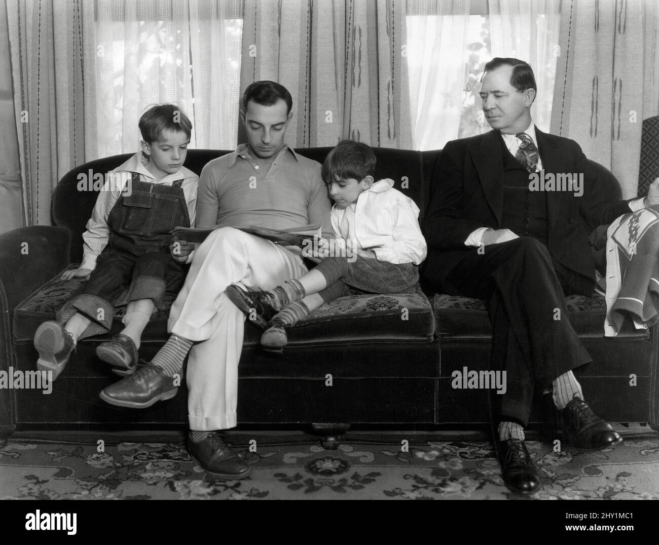 Buster Keaton with his two sons, Joseph and Robert, and his father Joe