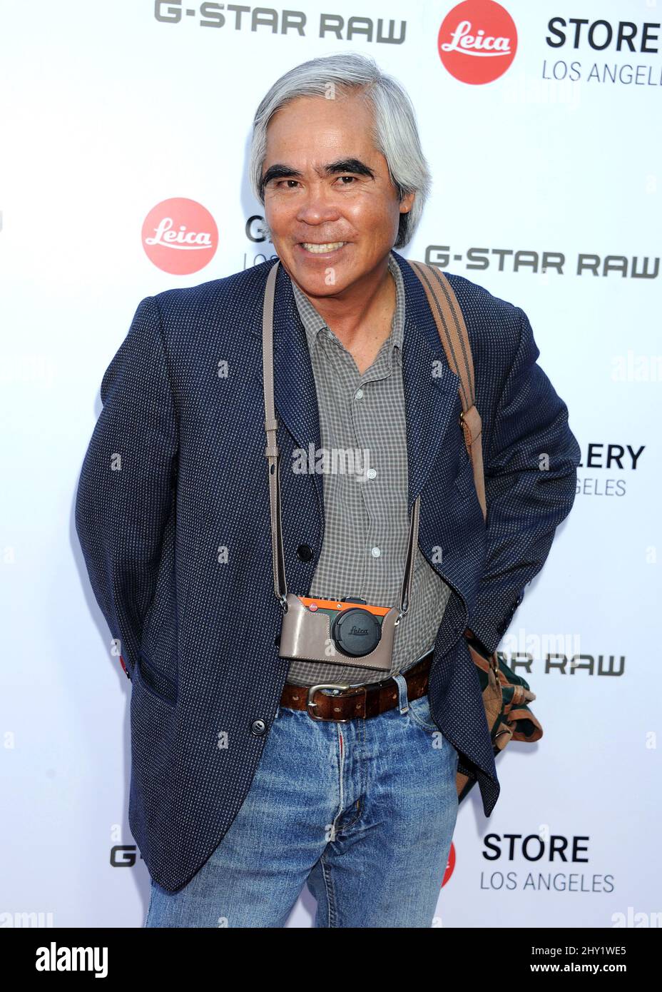 Nick Ut arriving at the Leica Store Los Angeles grand opening on Beverly Blvd. and Robertson Blvd. Stock Photo