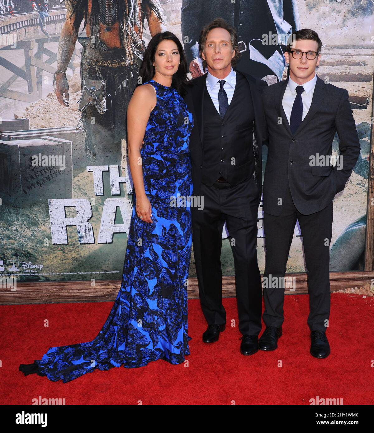 Kymberly Kalil, William Fichtner and Sam Fichtner attending 'The Lone Ranger' World Premiere at California Adventure in Los Angeles, USA. Stock Photo