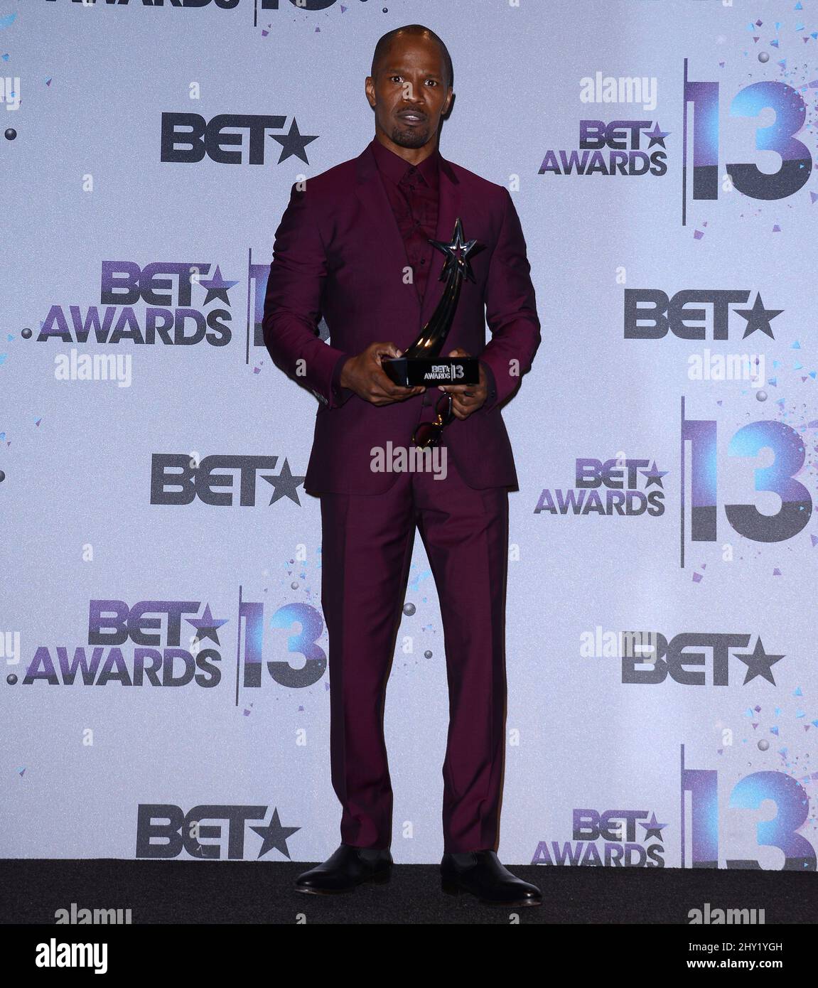 Jamie Foxx poses backstage with the award for best actor for 'Django: Unchained' at the BET Awards at the Nokia Theatre on Sunday, June 30, 2013, in Los Angeles. Stock Photo