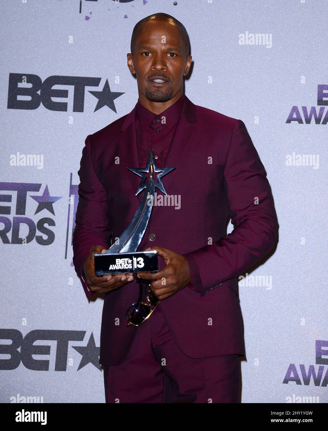Jamie Foxx poses backstage with the award for best actor for 'Django: Unchained' at the BET Awards at the Nokia Theatre on Sunday, June 30, 2013, in Los Angeles. Stock Photo