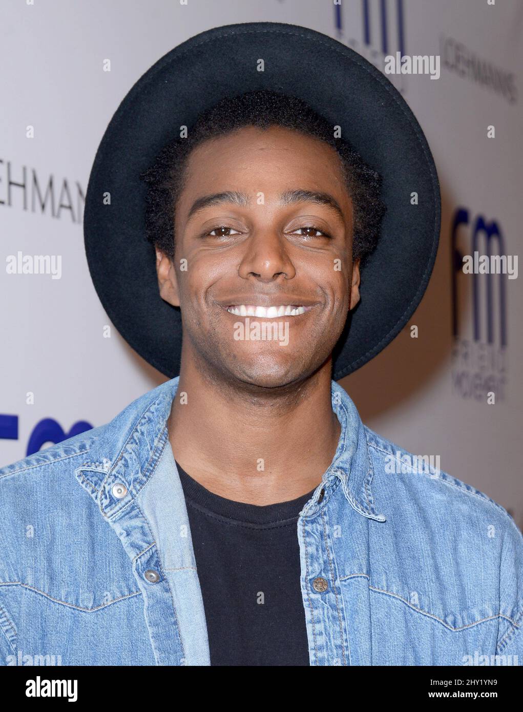 Austin Brown attending the Friend Movement Campaign Benefit Concert in