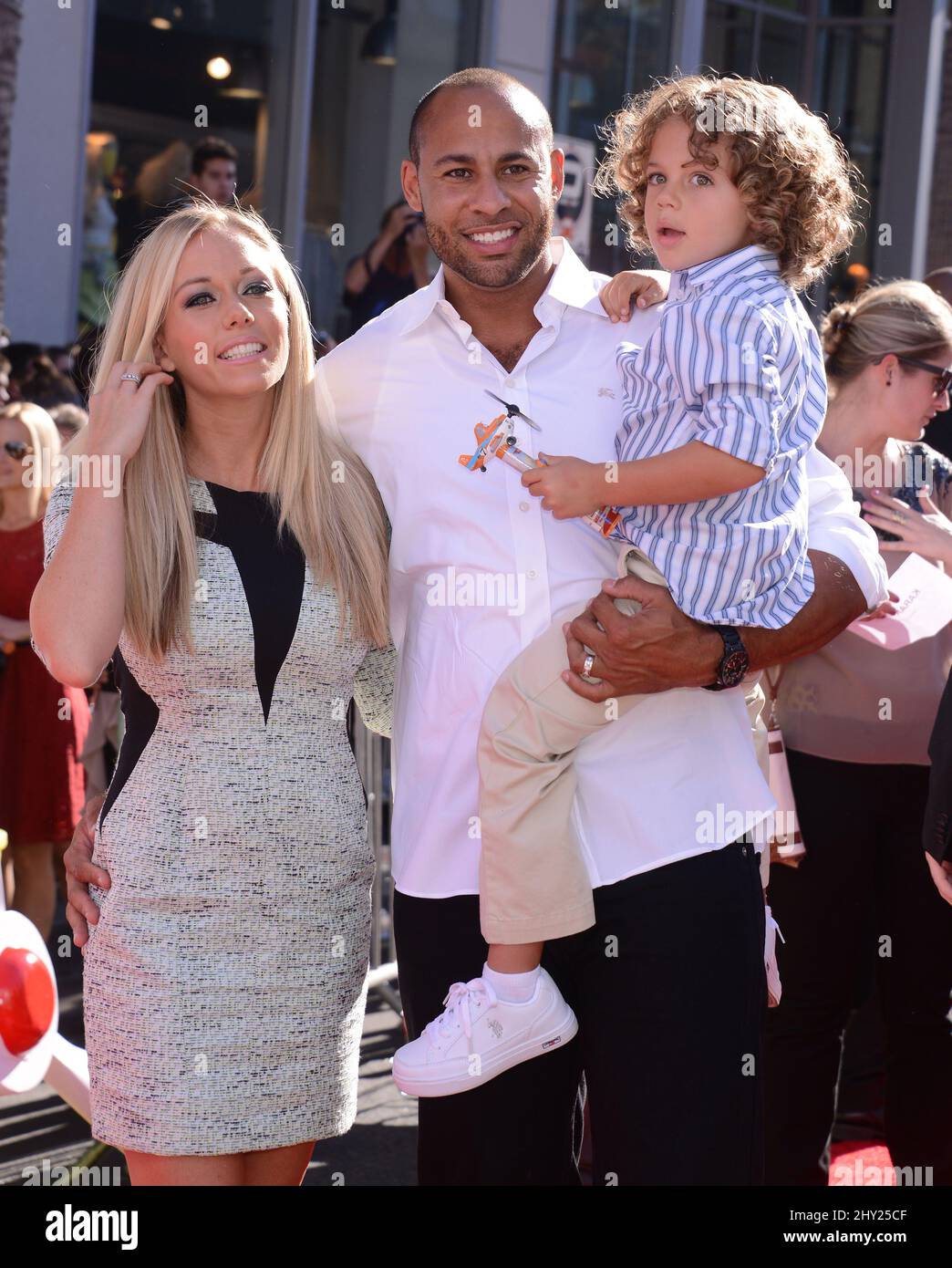 Kendra Wilkinson, Hank Baskett & Hank askett IV attending the 