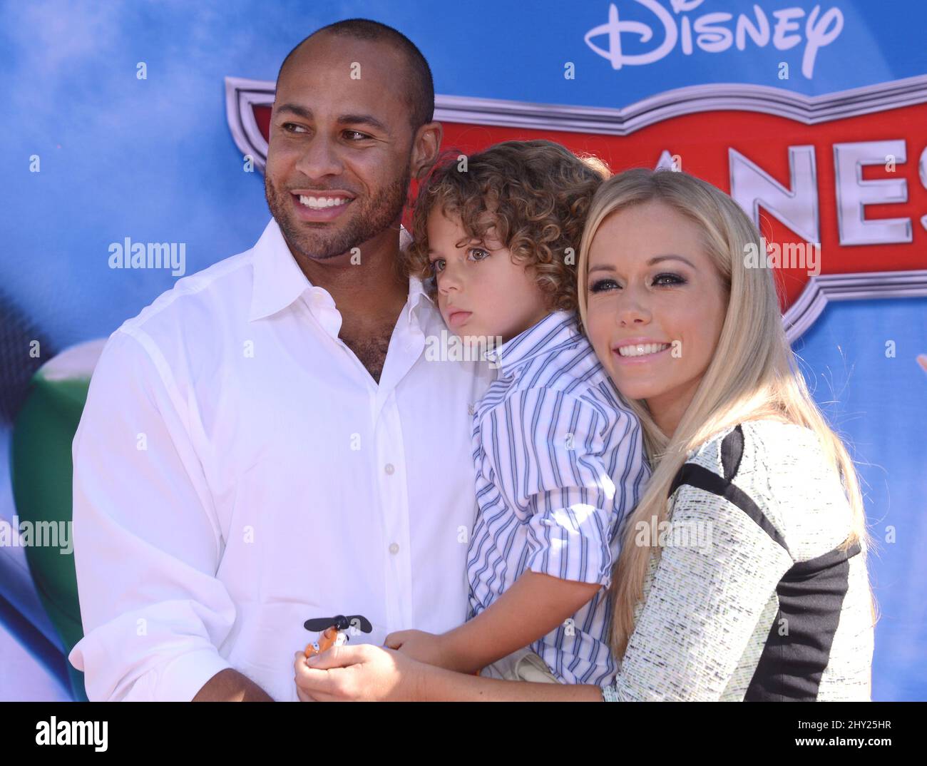 Kendra Wilkinson, Hank Baskett & Hank askett IV attending the 