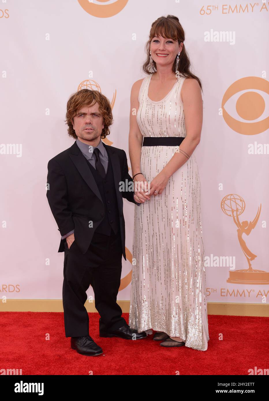 Peter Dinklage and Erica Schmidt attends the 65th Annual Primetime Emmy Awards held at the Nokia Theatre at L.A. Live, September 22, 2013 in Los Angeles. Stock Photo