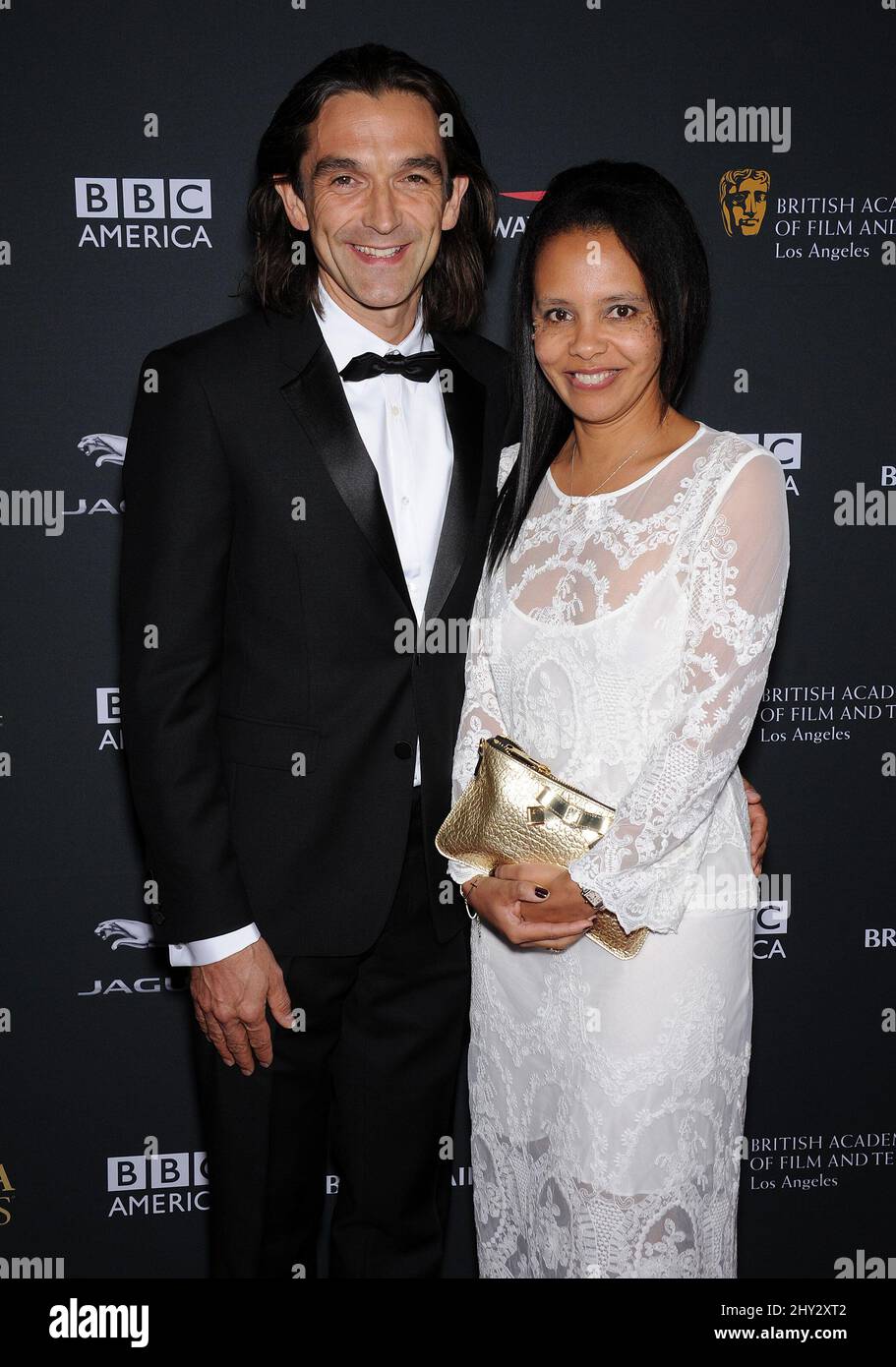 Justin Chadwick & Michelle attends the BAFTA LA Jaguar Britannia Awards 2013 at Hilton Hotel, Los Angeles. Stock Photo