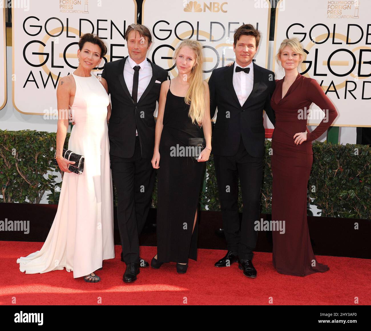 Mads Mikkelsen, Hanne Jacobsen and Thomas Vinterberg attending the 71st Annual Golden Globe awards Stock Photo