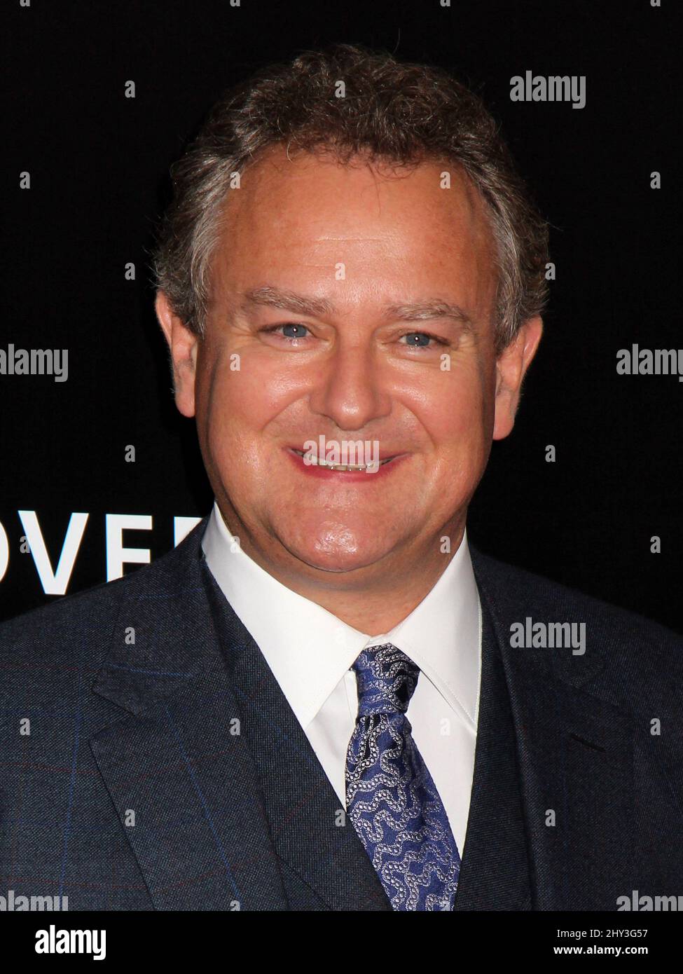 Hugh Bonneville attending the premiere of 'The Monuments Men' at the Ziegfeld Theater in New York City. Stock Photo